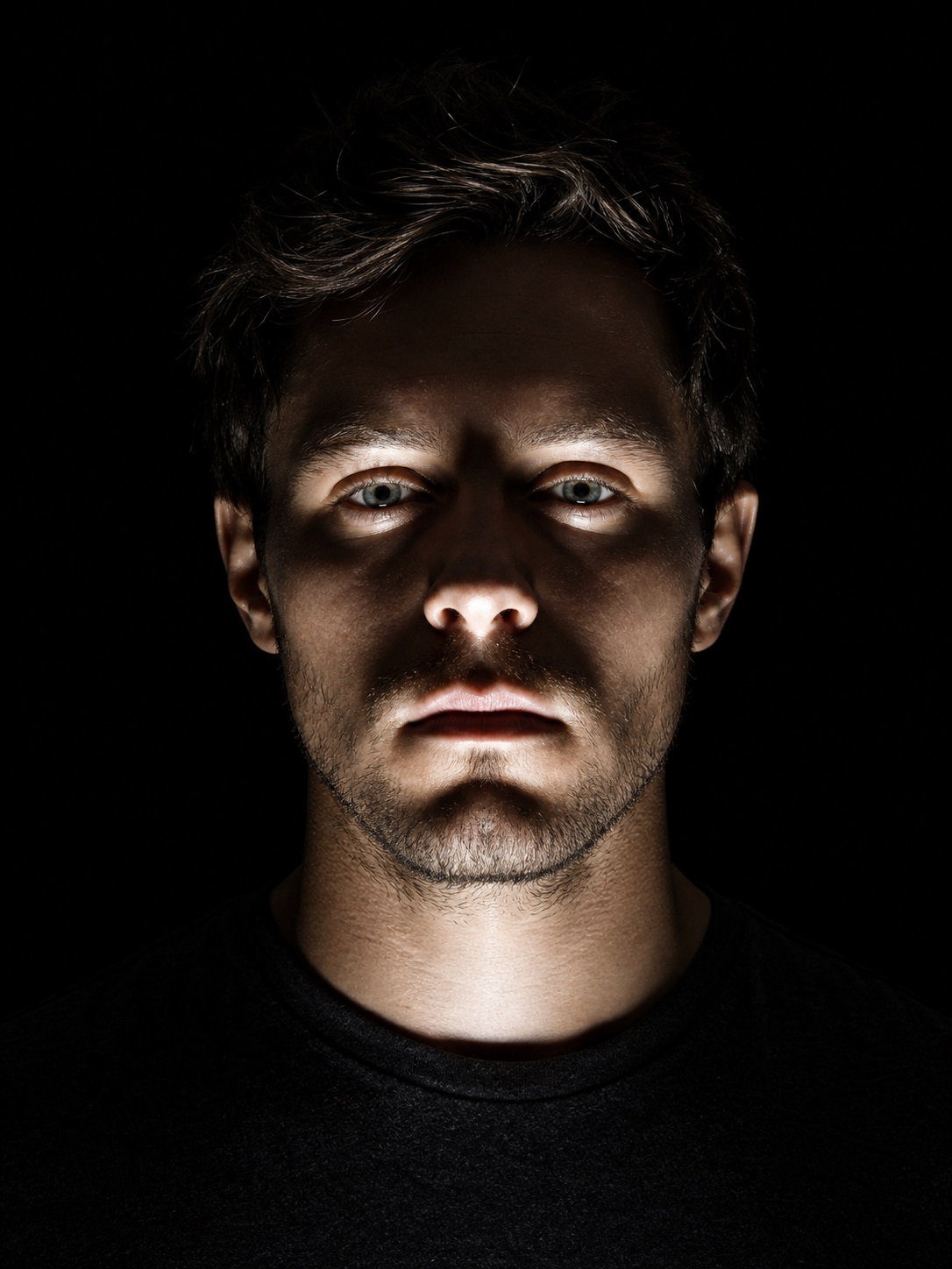 Dramatic bottom face lighting reference with upward shadows