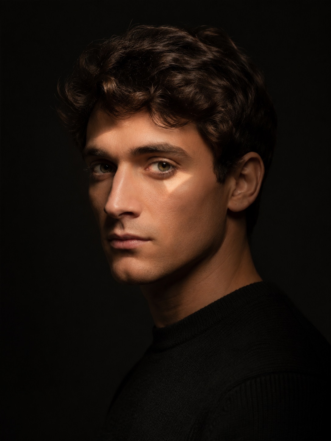 Rembrandt face lighting reference with triangle highlight
