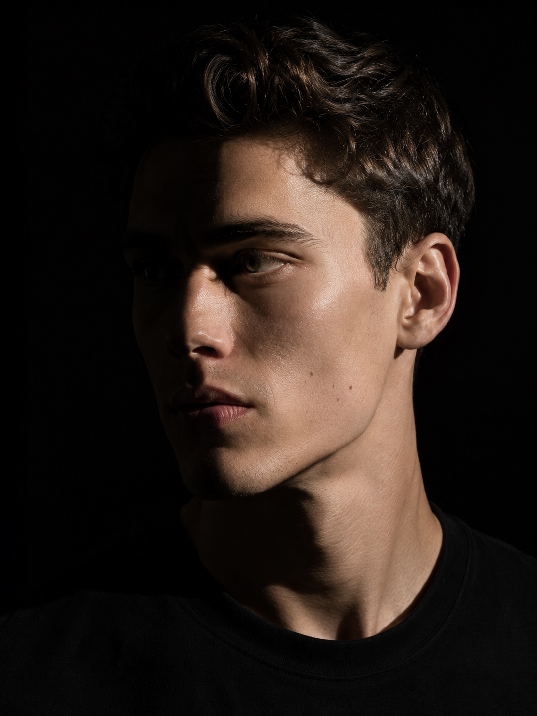 Side face lighting reference showing dramatic shadow patterns