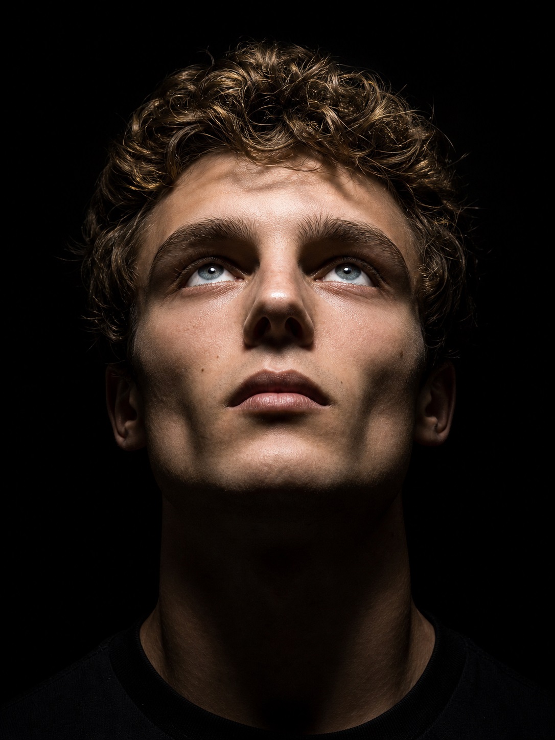 Top face lighting reference with shadows under brow and cheekbones