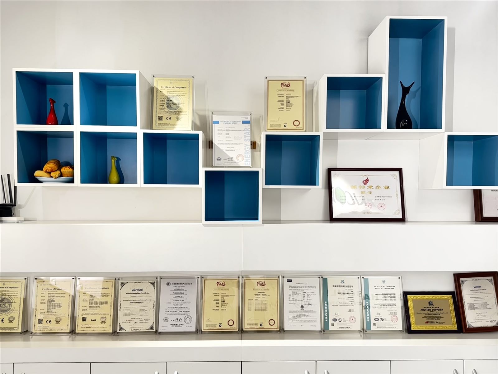 ENCORE certification wall with CE RoHS ISO and quality awards