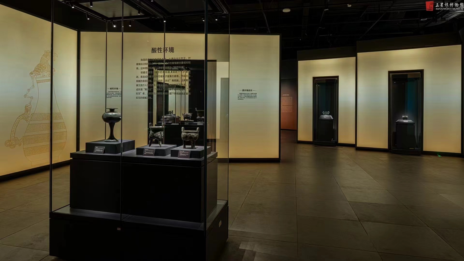 Sanxingdui Ruins Museum bronze vessel lit by museum-grade track lighting and downlights