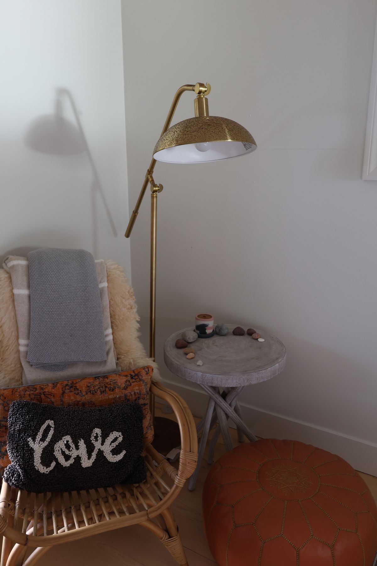 Warm and inviting reading nook with woven chair and ambient lighting for cozy evenings