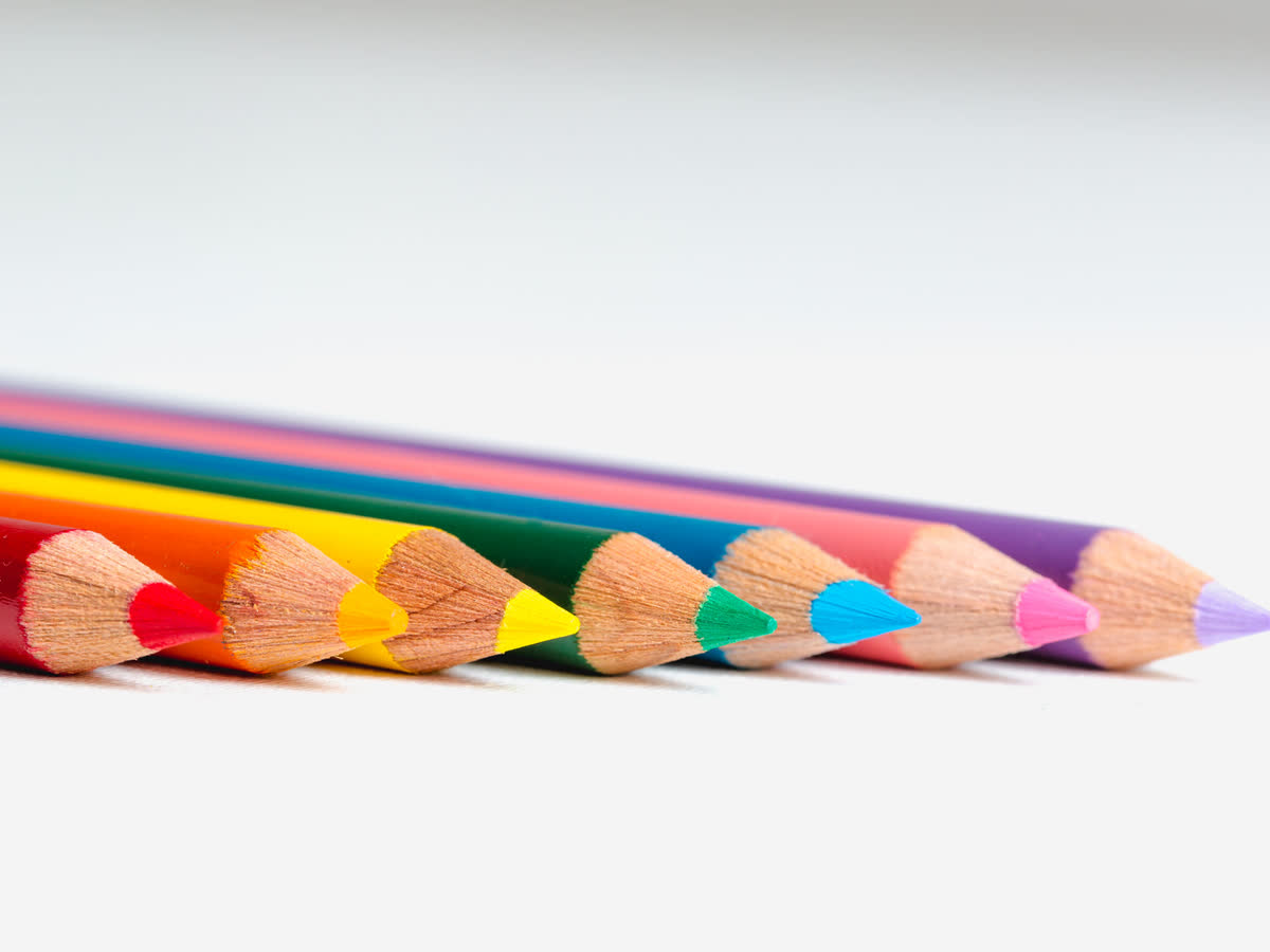 Row of sharpened colored pencils showing the saturated red orange and deep hues a high R9 LED light source renders distinctly